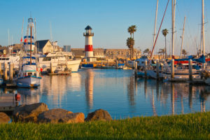 Oceanside Harbor with fishing boats and lighthouse