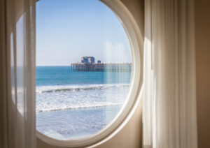 window overlooking the oceanside pier