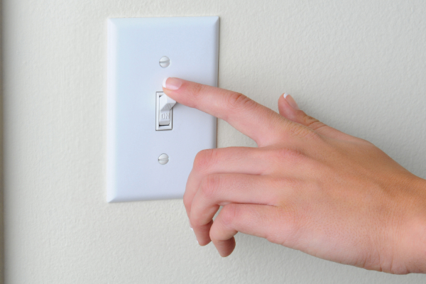 person turning off lights