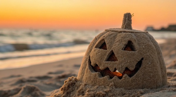 pumpkin made out of sand on the beach