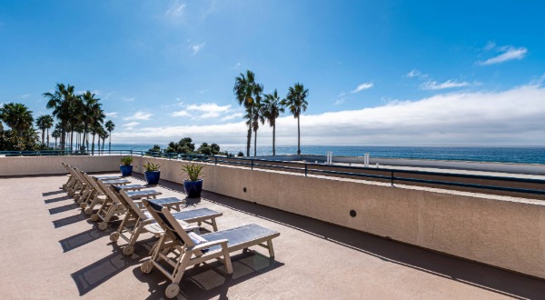 lounge chairs on the deck overlooking the ocean