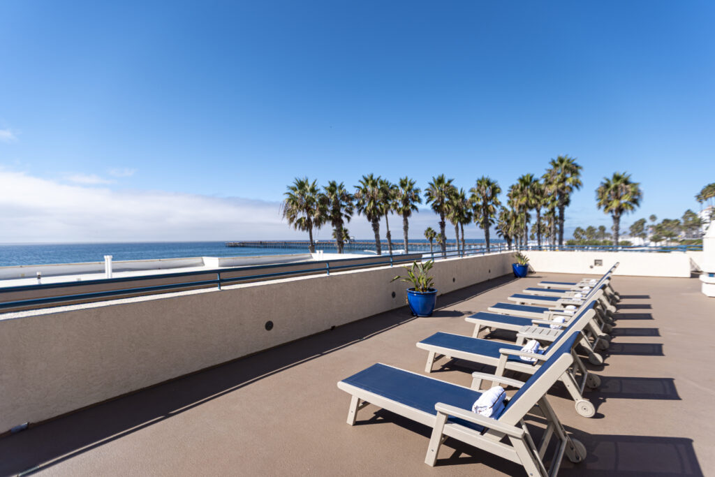 Lounge chairs, view of ocean and pier