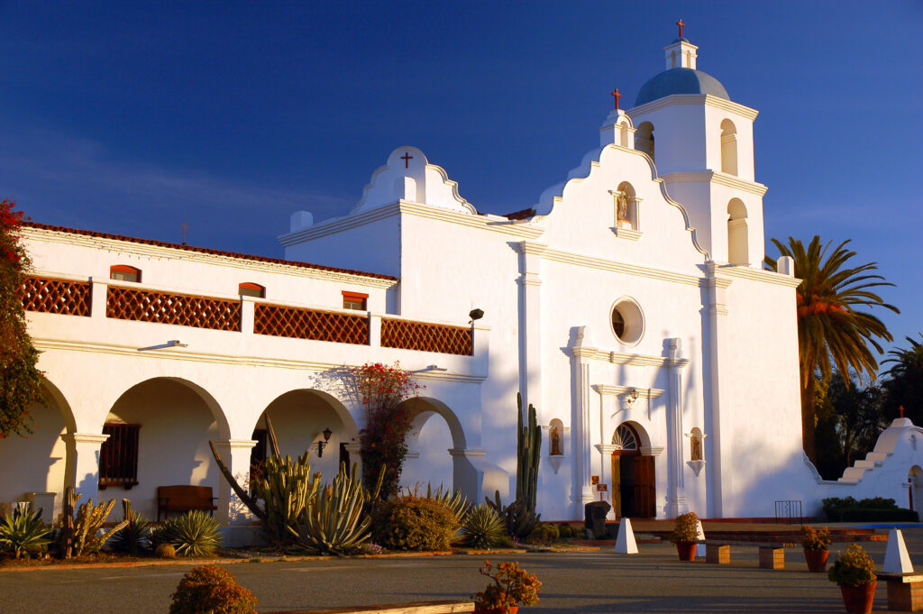 The Mission San Luis Rey de Francia glows brightly in the California sunlight
